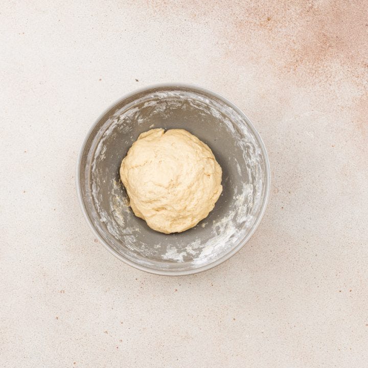 Babka dough ball in bowl.
