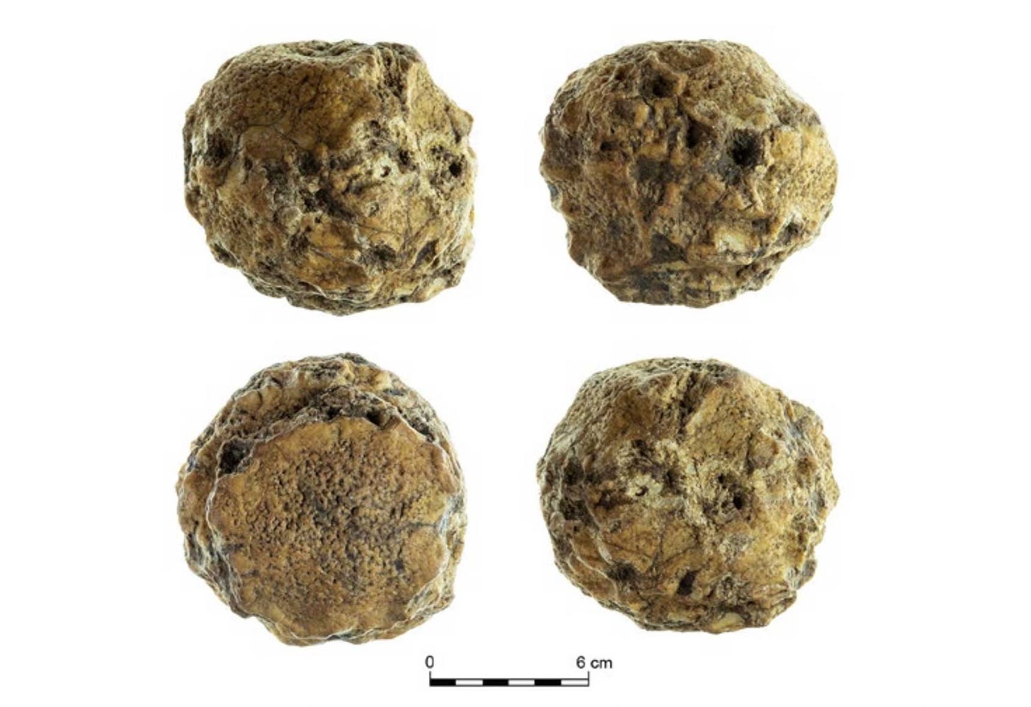 A natural geode used for pounding by ancient people and worn into a spheroid shape