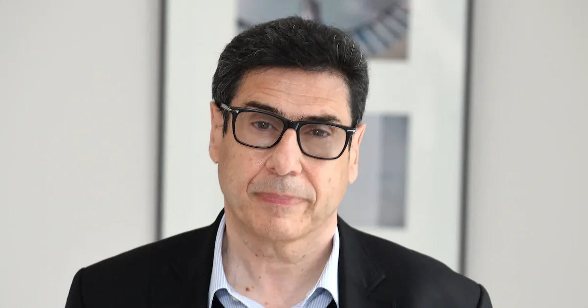 French Economist Philippe Aghion poses at the College de France in Paris on June 08, 2021. (Photo by Eric PIERMONT / AFP)