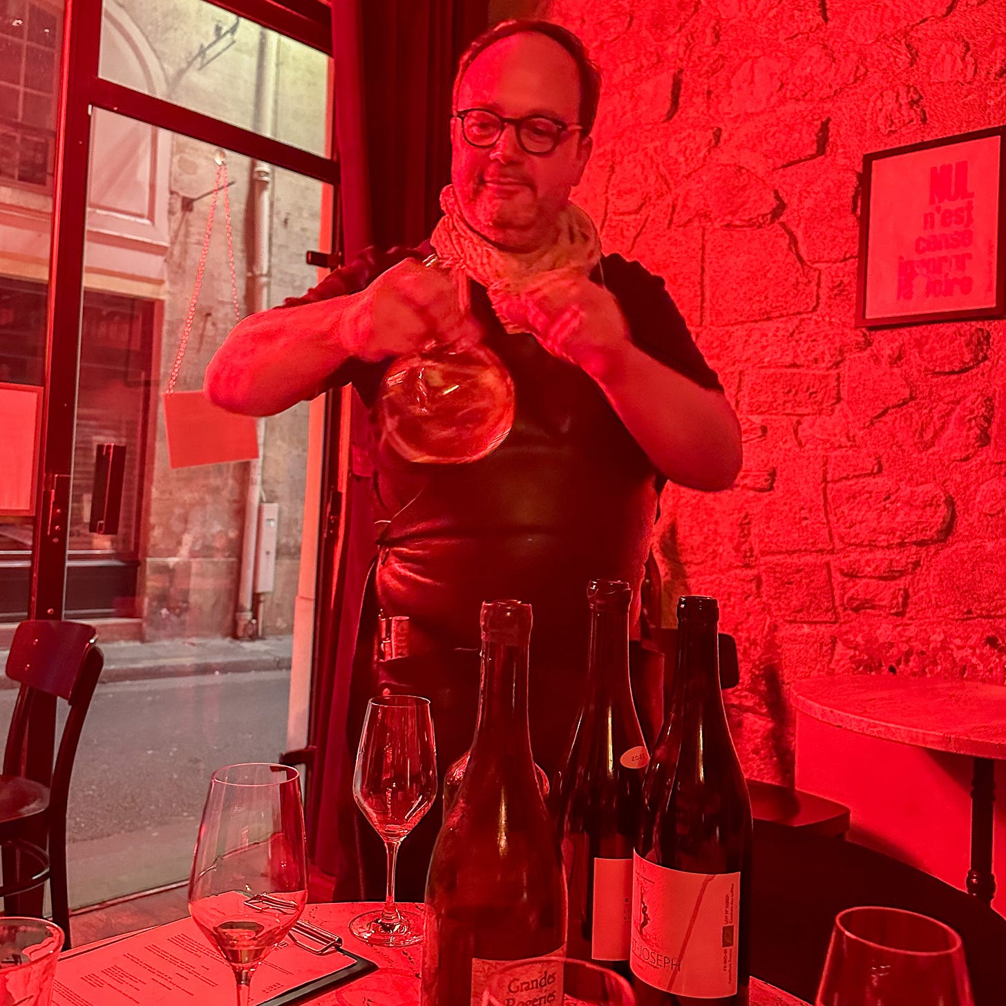 owner of Augustin Marchand d'Vins wine bar in saint-germain, paris