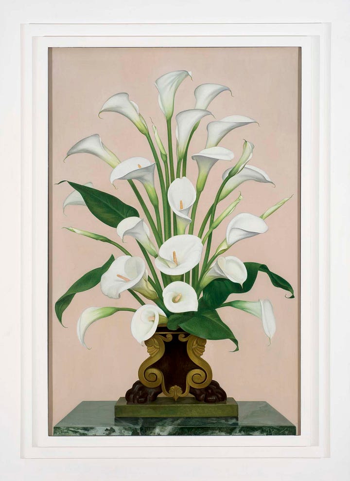 1) Painting of a potted plant with green stems and leaves, featuring 2 large, white, trumpet-shaped flowers at the top. Background is a soft purple gradient, creating a serene tone. The plant is sitting in a grey pot, and it's tall with most of the plant being stems, and leaves. 2) A vase of white calla lilies with lush dark green leaves against a soft pink background. The ornate vase sits on a marble surface, evoking elegance. The painting is inside of one of Gluck's patented frames. The vase is black with gold accents.