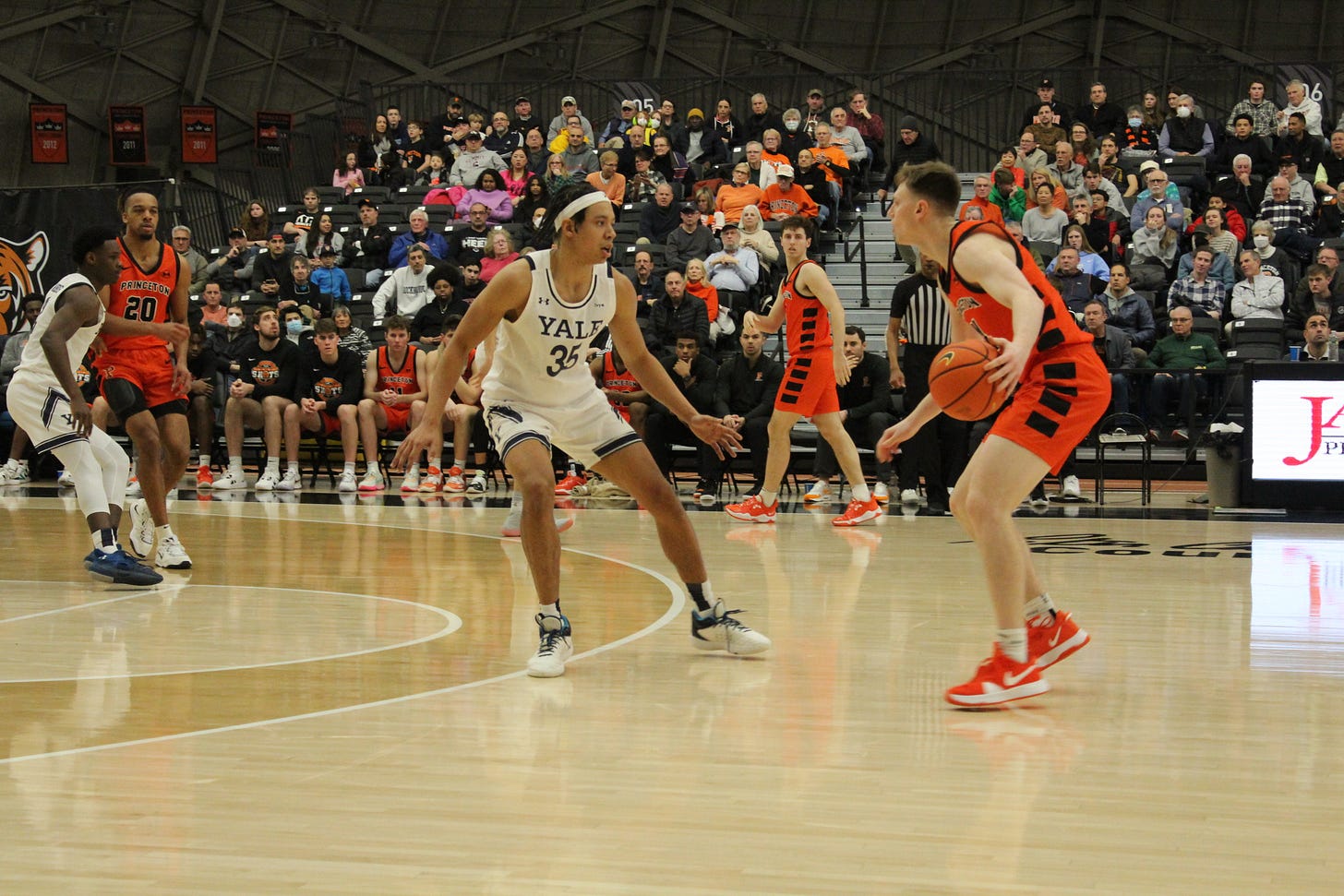 Isaiah Kelly of Yale (#35) guards Matt Allocco of Princeton during a game on Feb. 18, 2023. (Photo by Adam Zielonka) Isaiah Kelly of Yale (#35) guards Matt Allocco of Princeton during a game on Feb. 18, 2023. (Photo by Adam Zielonka)