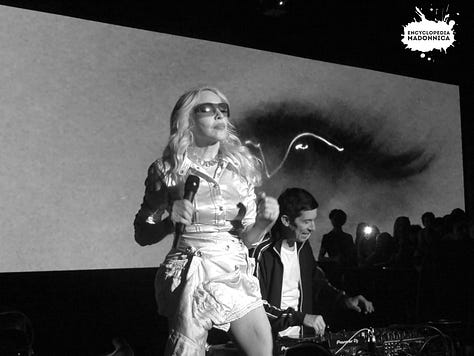 Madonna's dress came undone. She walked off, fixed it, returned.