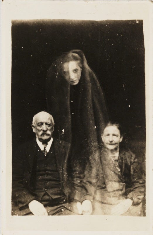 <i>Elderly couple with young female spirit</i>. Photograph by William Hope / Flickr <i>Elderly couple with young female spirit</i>. Photograph by William Hope / Flickr