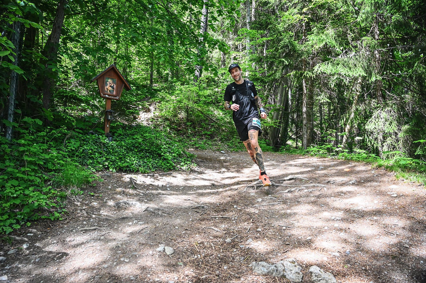The author running on a trail at the IATF