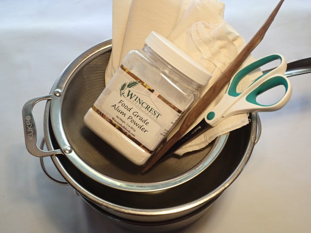 A group of natural-dye tools includes stainless steel pot, bowl, strainer, alum, kitchen shear, wooden spoon, and muslin cloth. A group of natural-dye tools includes stainless steel pot, bowl, strainer, alum, kitchen shear, wooden spoon, and muslin cloth.