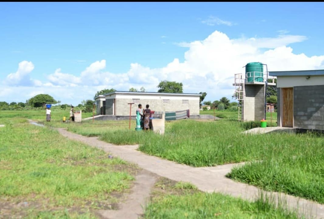 May be an image of 2 people and grass May be an image of 2 people and grass