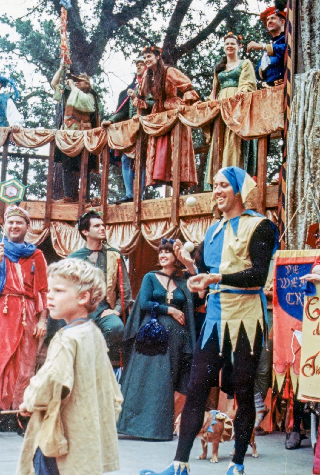 Phyllis Patterson stands on a balcony (in orange) at the 1967 fair in Ventura