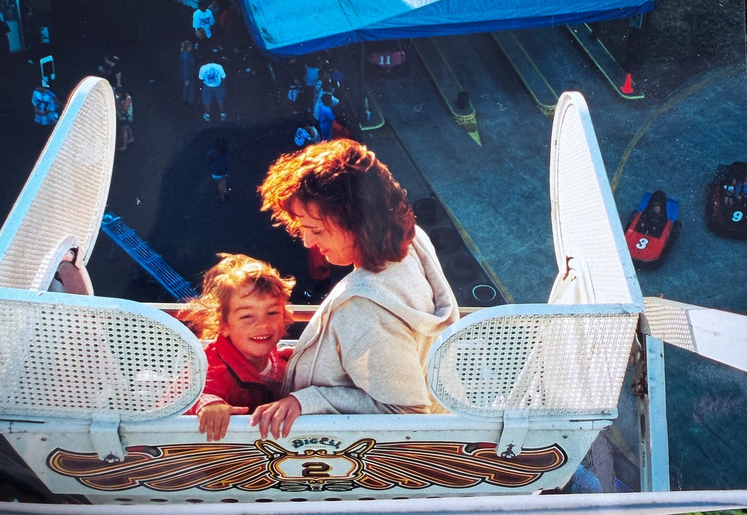 woman and child in a ferris wheel ride