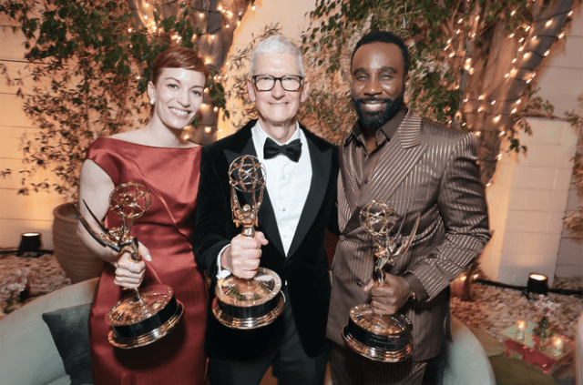 From left to right: Britt Lower, Tim Cook, and Tramell Tillman attend the 2025 Apple TV+ Emmy Awards celebration at Ysabel in West Hollywood, California.