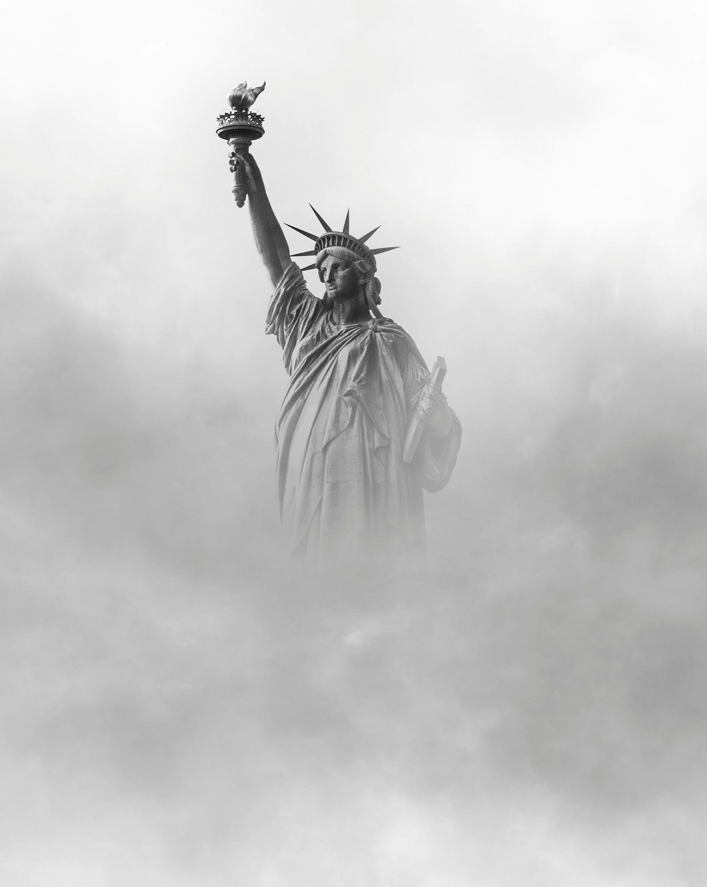 The Statue of Liberty emerging through thick fog, her torch faintly glowing above the haze, a symbol of freedom and promise partially obscured, yet still standing.