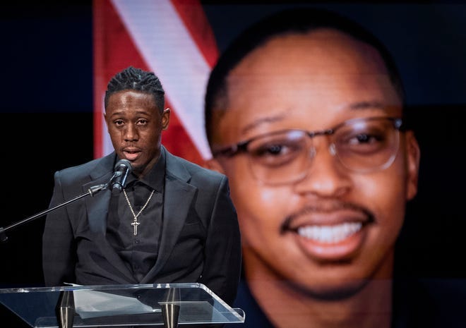 Bryan Murphy speaks at the funeral for Delray Beach Fire Rescue Lt. Ray Keith at Christ Fellowship Church in Royal Palm Beach, Florida on October 26, 2023. Keith, 31, died October 18 after a two-year battle with colon cancer. Bryan Murphy speaks at the funeral for Delray Beach Fire Rescue Lt. Ray Keith at Christ Fellowship Church in Royal Palm Beach, Florida on October 26, 2023. Keith, 31, died October 18 after a two-year battle with colon cancer.