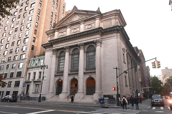 A building with columns and people walking on the street
AI-generated content may be incorrect. A building with columns and people walking on the street
AI-generated content may be incorrect.