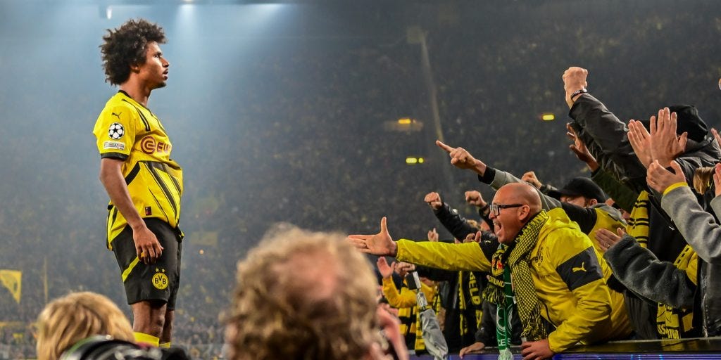Karim Adeyemi after completing his hat-trick against Celtic in the Westfalenstadion (Imagn)