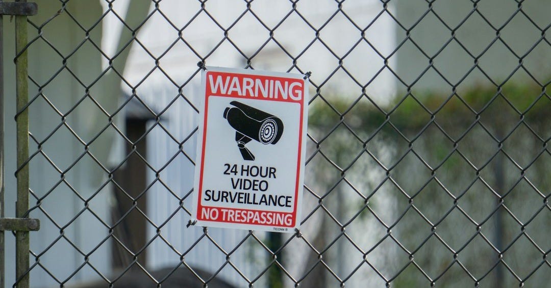 Warning sign for 24 hour video surveillance
