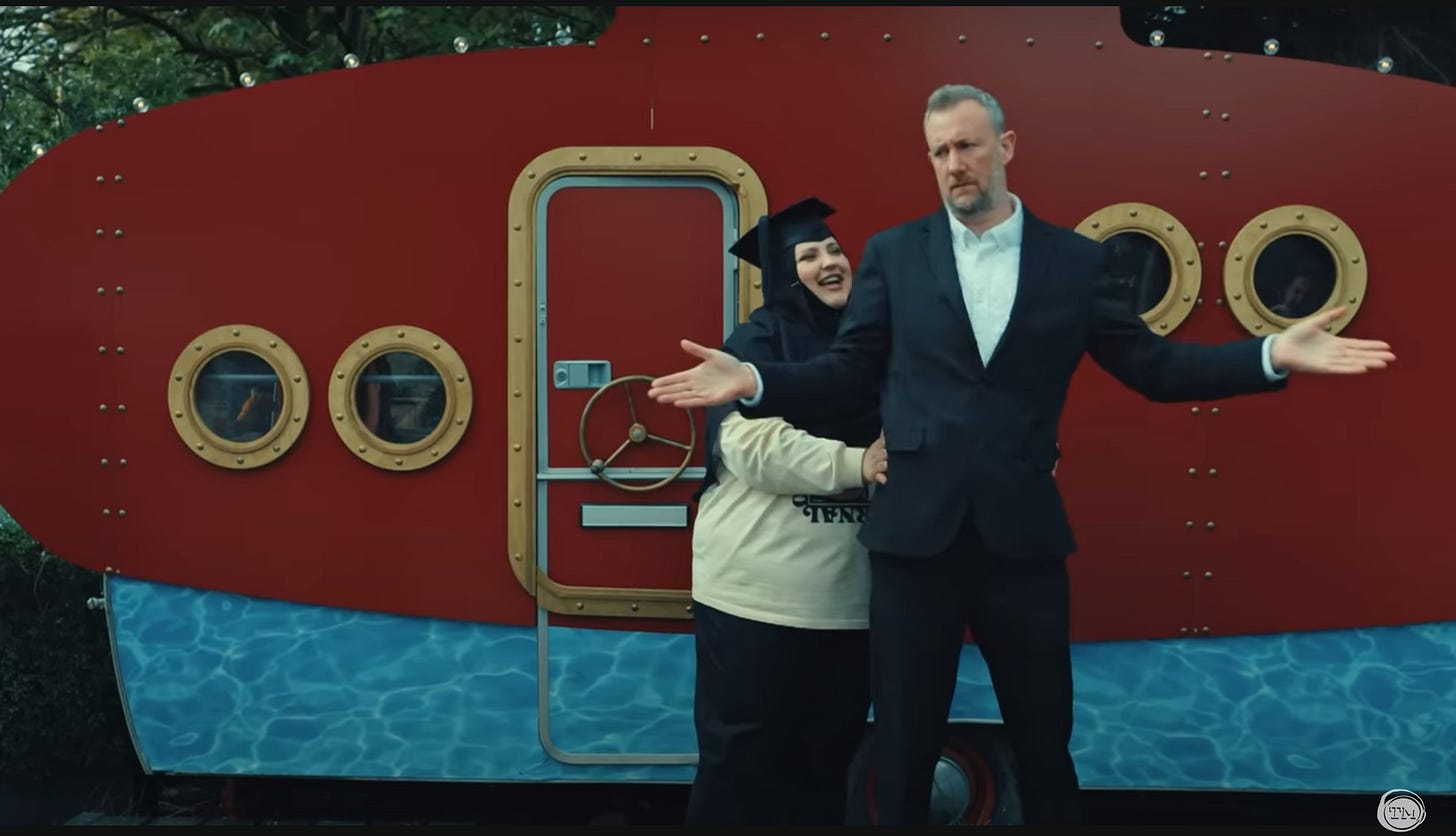 Fatiha El-Ghorri shows Little Alex Horne how to move his shoulders.