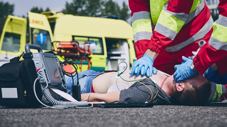 Heart attack victim receiving emergency treatment