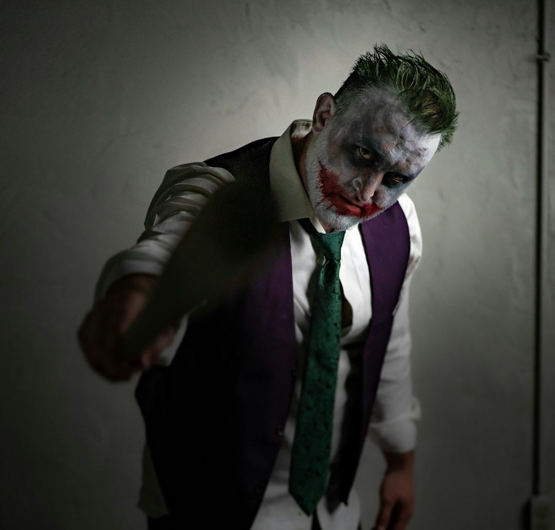 man in brown suit jacket