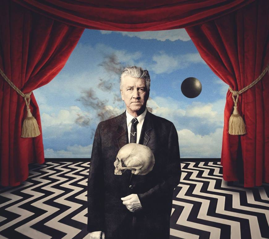 Man in suit holding skull on zigzag floor, surreal stage with clouds, smoke, and floating sphere