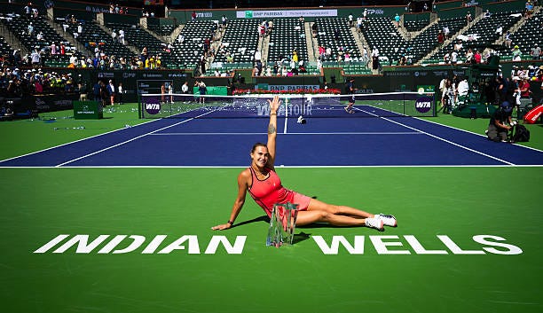 Aryna Sabalenka poses with the champions trophy after defeating Elena Rybakina of Kazakhstan in the womens singles final on Day 12 of the BNP Paribas... Aryna Sabalenka poses with the champions trophy after defeating Elena Rybakina of Kazakhstan in the womens singles final on Day 12 of the BNP Paribas...