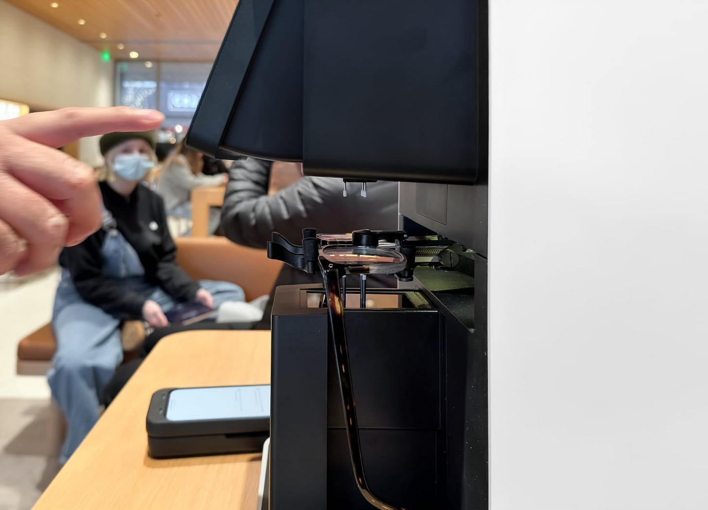 A macro shot of the Apple Vision Pro lens scanning machine.