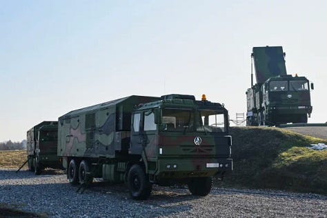 Photo 1: The FK-3 surface-to-air missile system launcher in a ready-to-deploy position. (Credit: Serbia's Ministry of Defence press office)  Photo 2: Command and control vehicles of the FK-3 air defense system in position, highlighting advanced mobility and operational readiness. (Credit: Serbia's Ministry of Defence press office)  Photo 3: A radar unit of the FK-3 air defense system deployed, showcasing its surveillance and target acquisition capabilities. (Credit: Serbia's Ministry of Defence press office)
