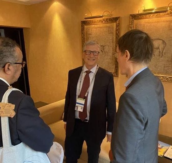 May be an image of 3 people, people standing and indoor