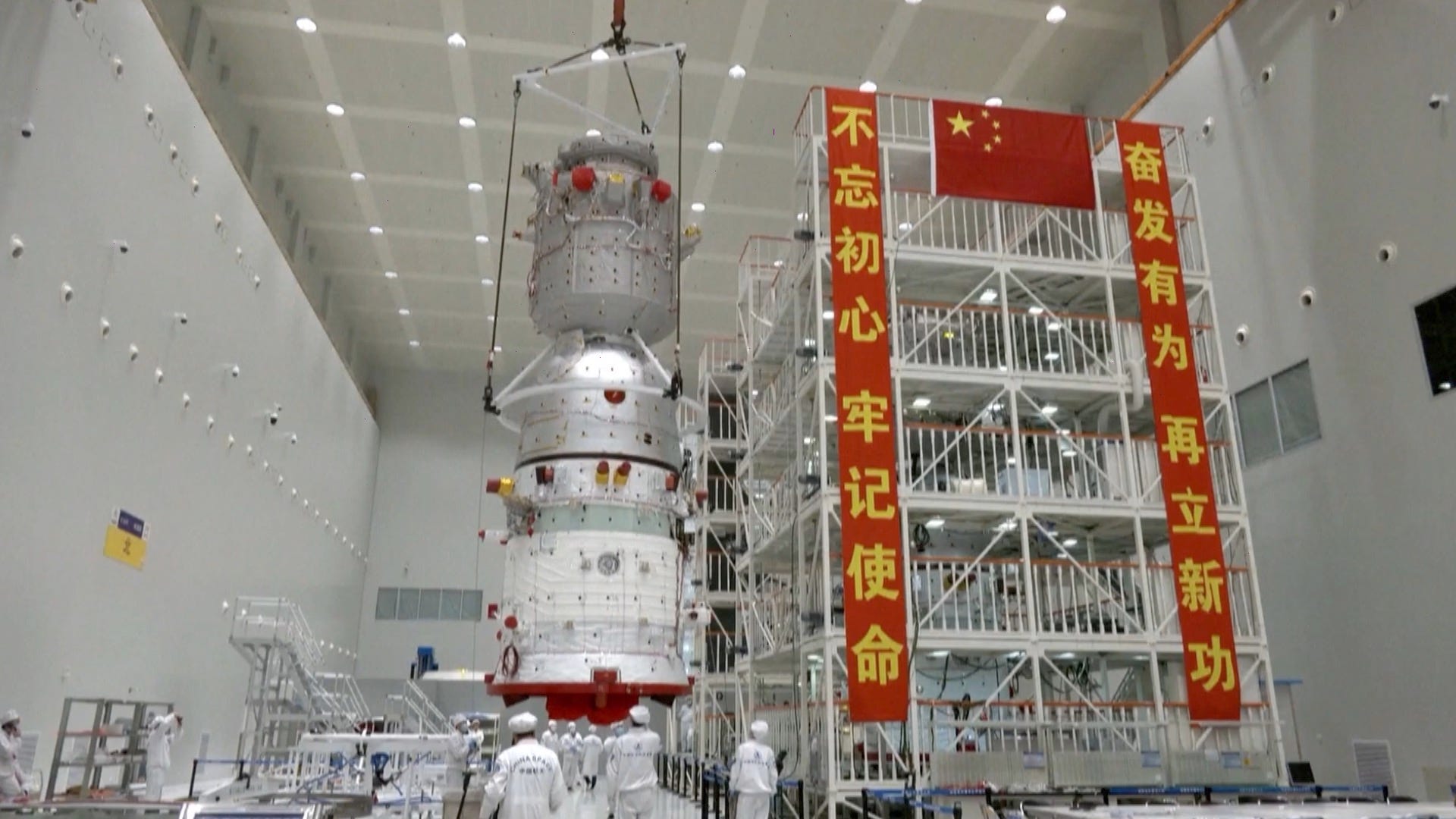 A Shenzhou spacecraft undergoing launch preparations ahead of encapsulation with its launch escape system at the Jiuquan Satellite Launch Center in 2022.