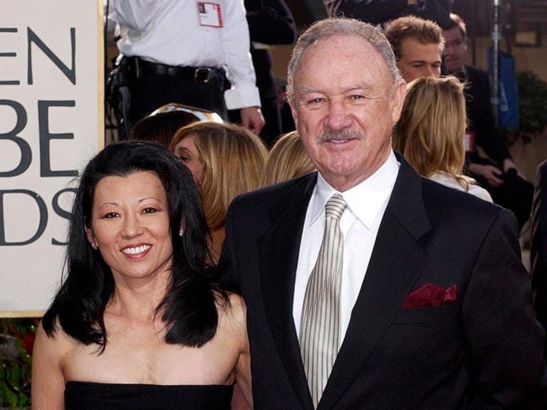 Gene Hackman arrives with his wife, Betsy Arakawa, for the 60th Annual Golden Globe Awards in Beverly Hills, Calif., Jan. 19, 2003.