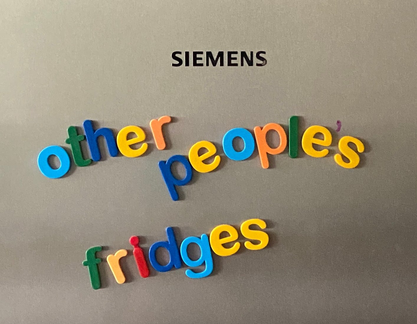 Fridge door with magnetic letters.