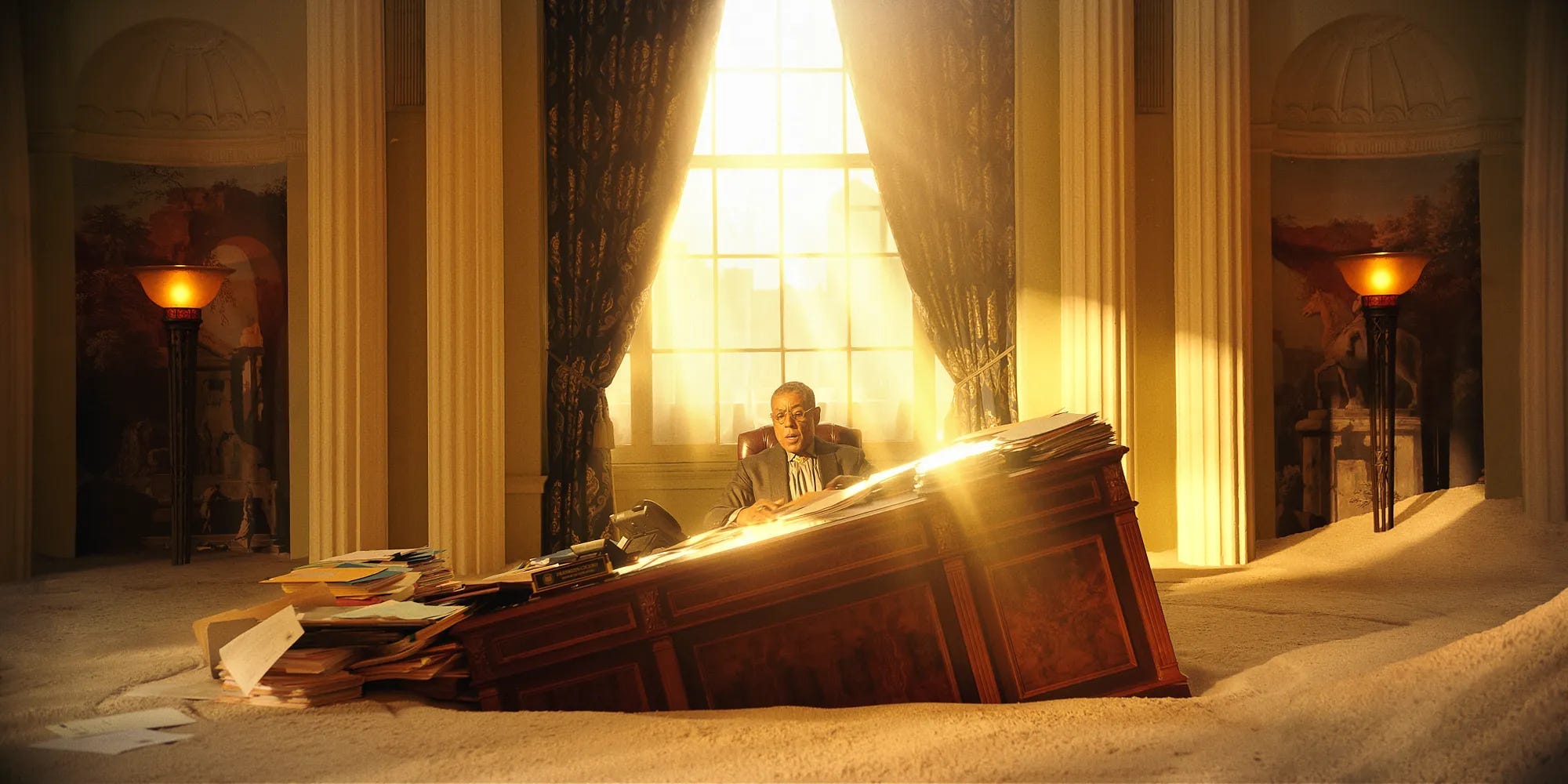 Mayor Cicero [Giancarlo Esposito] sinks, in Megalopolis. PHOTO: Courtesy of Lionsgate