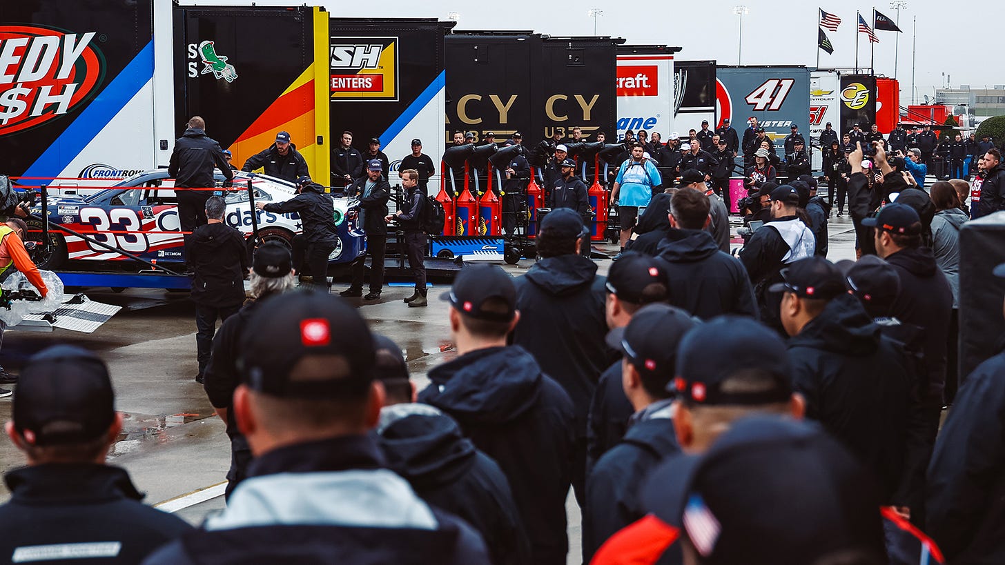 The NASCAR Cup Series garage watches on as the No. 33 Richard Childress Racing team unloads its car at Charlotte Motor Speedway. The NASCAR Cup Series garage watches on as the No. 33 Richard Childress Racing team unloads its car at Charlotte Motor Speedway.