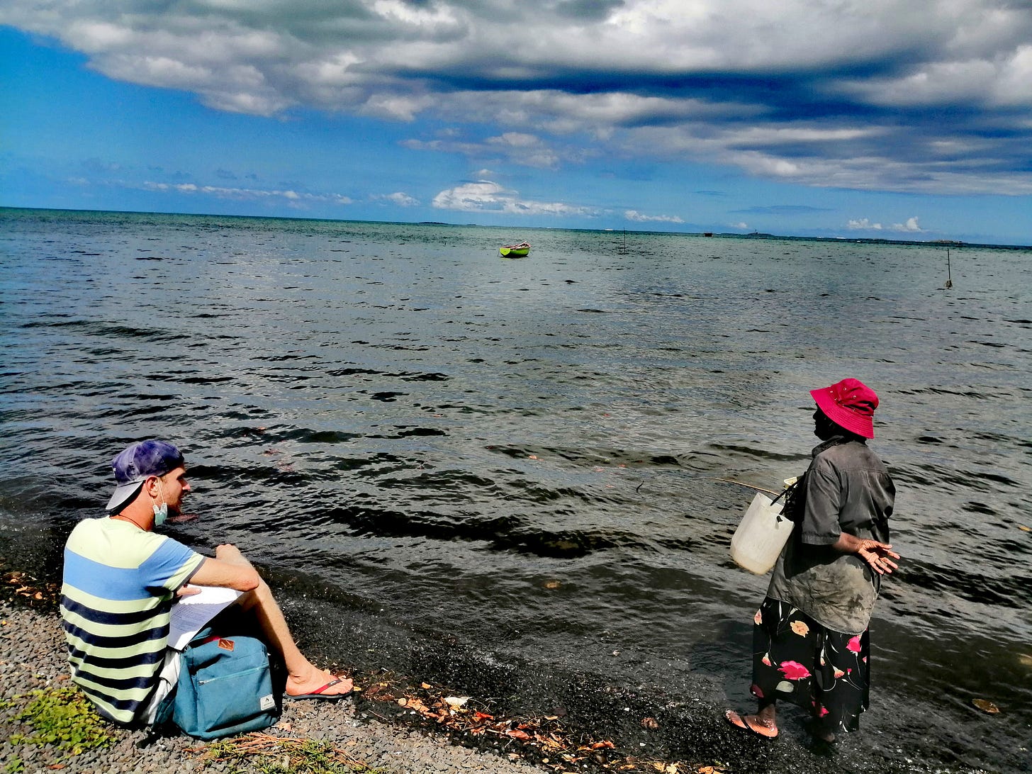 Photo: The lead researcher, Raphael, collecting notes from a southeast coastal inhabitant on mangroves. Credit: Raphael Merven Photo: The lead researcher, Raphael, collecting notes from a southeast coastal inhabitant on mangroves. Credit: Raphael Merven