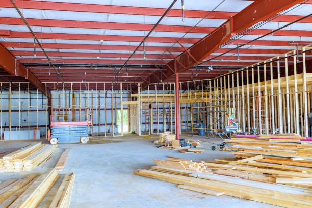 Construction is currently underway in a large room of warehouse to reconstruct interior Construction is currently underway in large room of warehouse to reconstruct interior Store Build-Out stock pictures, royalty-free photos & images Construction is currently underway in a large room of warehouse to reconstruct interior Construction is currently underway in large room of warehouse to reconstruct interior Store Build-Out stock pictures, royalty-free photos & images