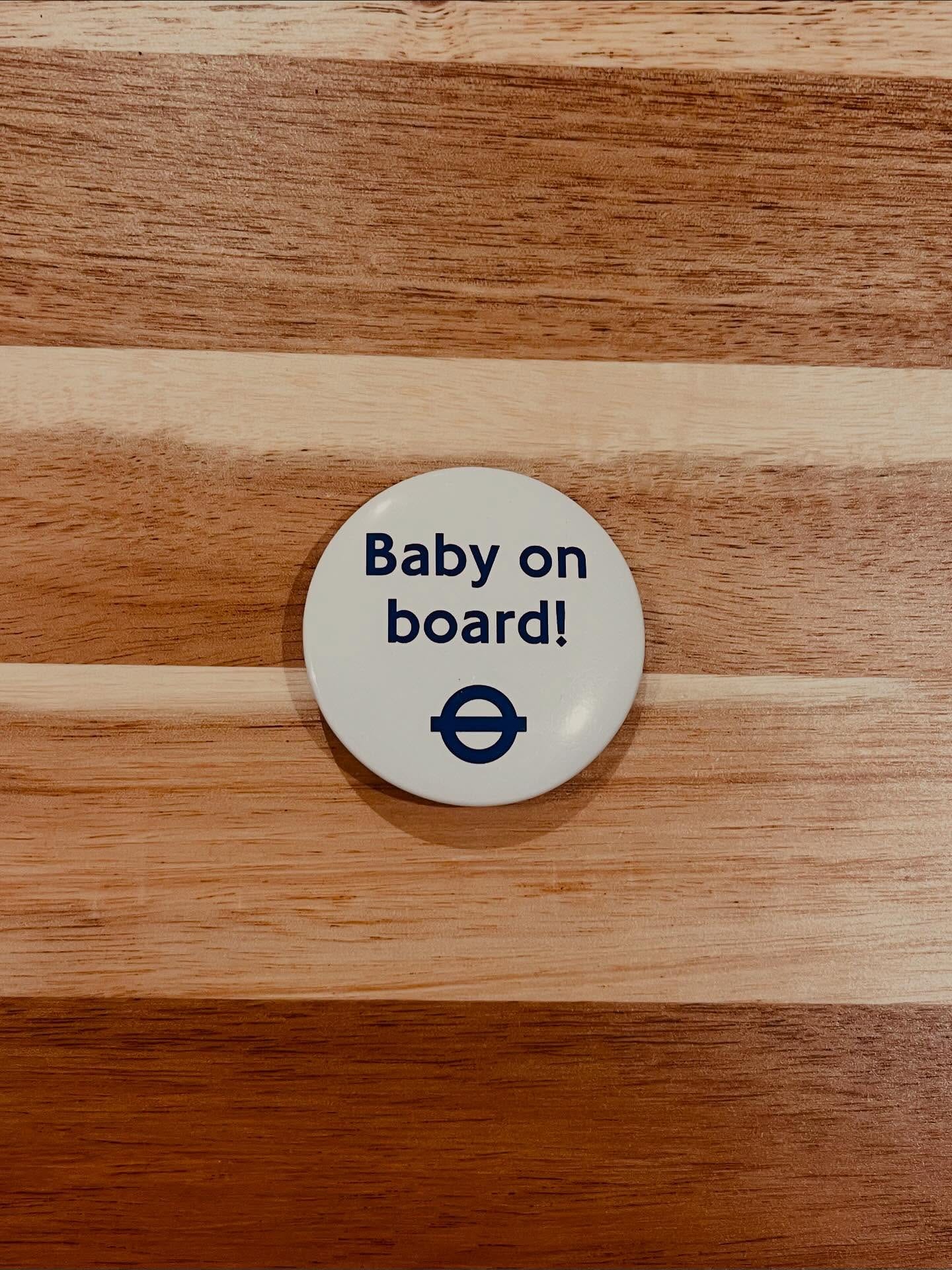 May be an image of button and text that says 'Baby on board!' May be an image of button and text that says 'Baby on board!'