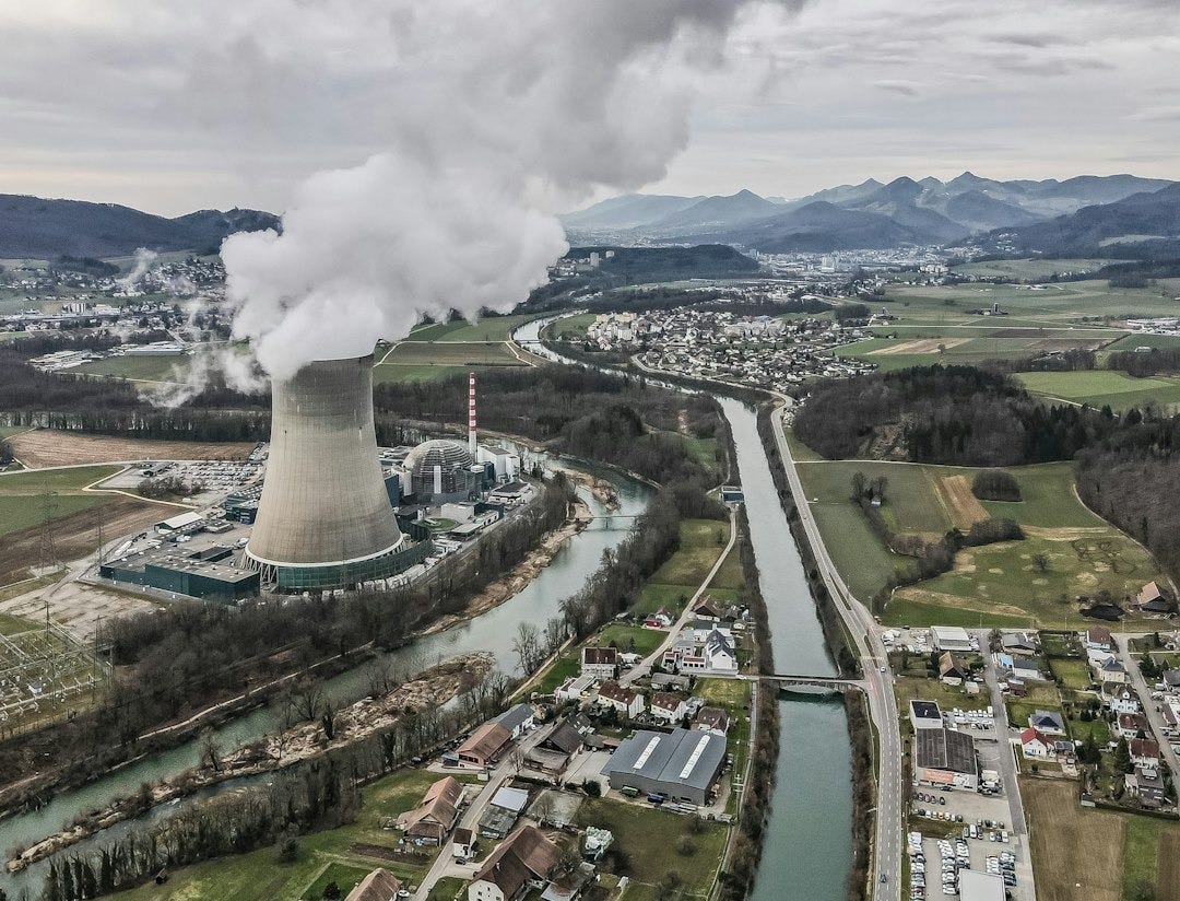 white smoke coming out from the factory