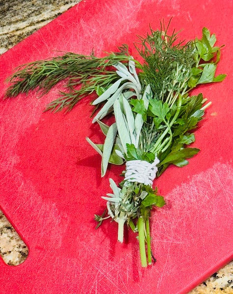 Mushrooms on a cutting board: king oyster, brown beech, and shiitake. A bouquet garni of thyme, dill, sage, and parsley tied together with kitchen twine. Flour being added to softened mushrooms, leeks, and celery in a stock pot for Irish wild mushroom soup.