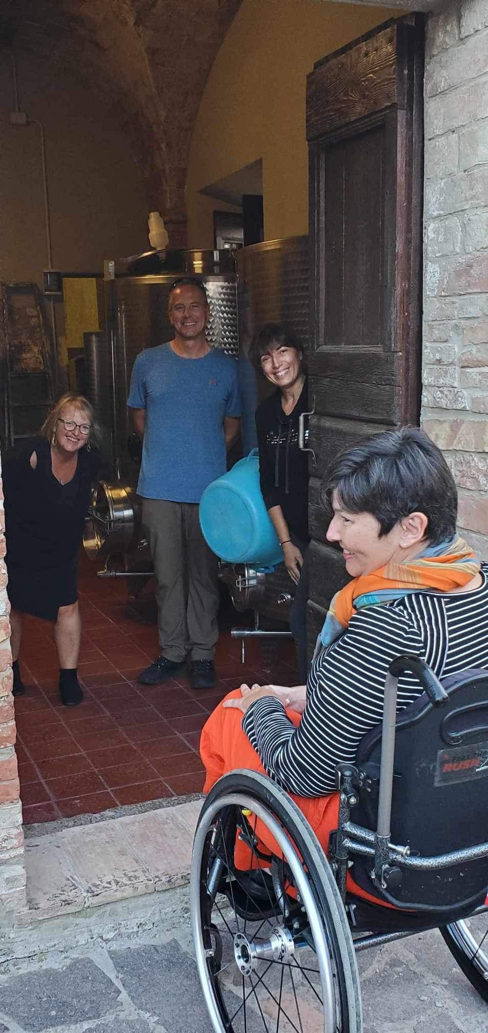Claudia showed us where the wine was made in this ancient farmhouse. Photo shows Sue, Vic, Claudia and myself in the winery.