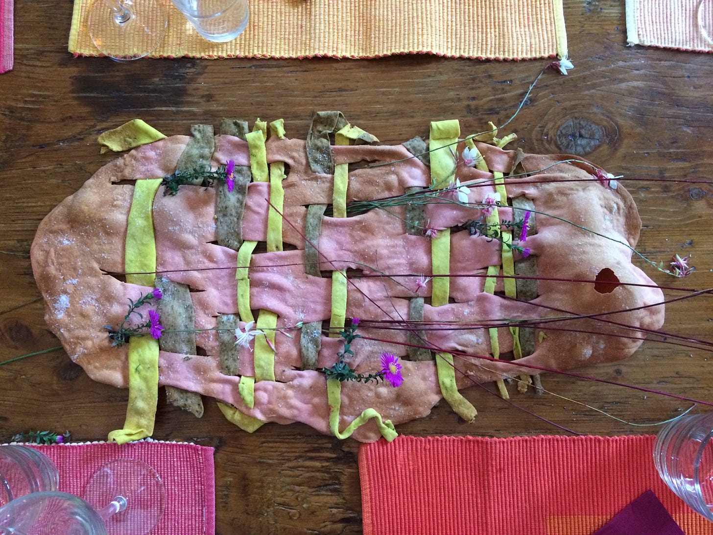 Pasta coloured with vegetable juice, woven (to reflect our work), baked to a crisp then placed on the table to share
