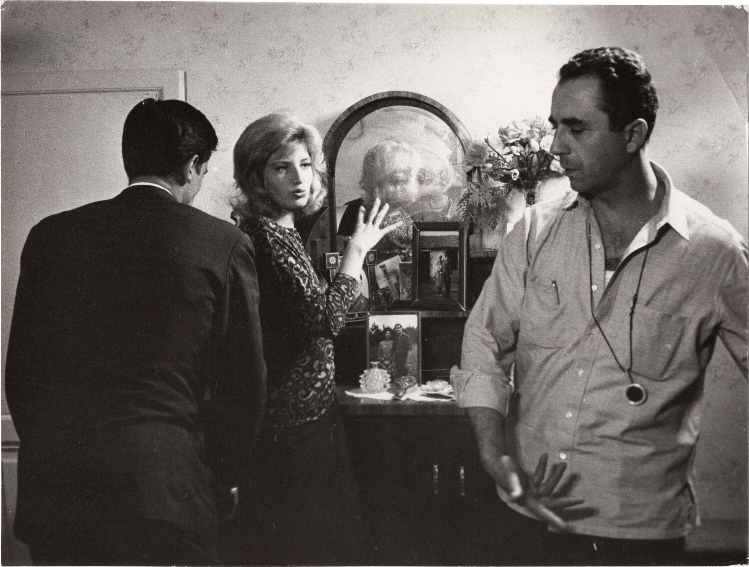 L'Eclisse [The Eclipse] (Two original photographs from the set of the 1962  film) by Michelangelo Antonioni (director, screenwriter); Tonino Guerra,  Elio Bartolini, Ottiero Ottieri (screenwriter); Alain Delon, Monica Vitti,  Francisco Rabl, Louis