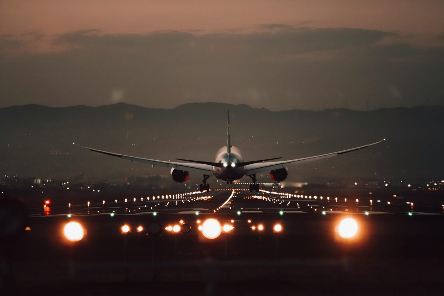 Plane landing on runway Plane landing on runway