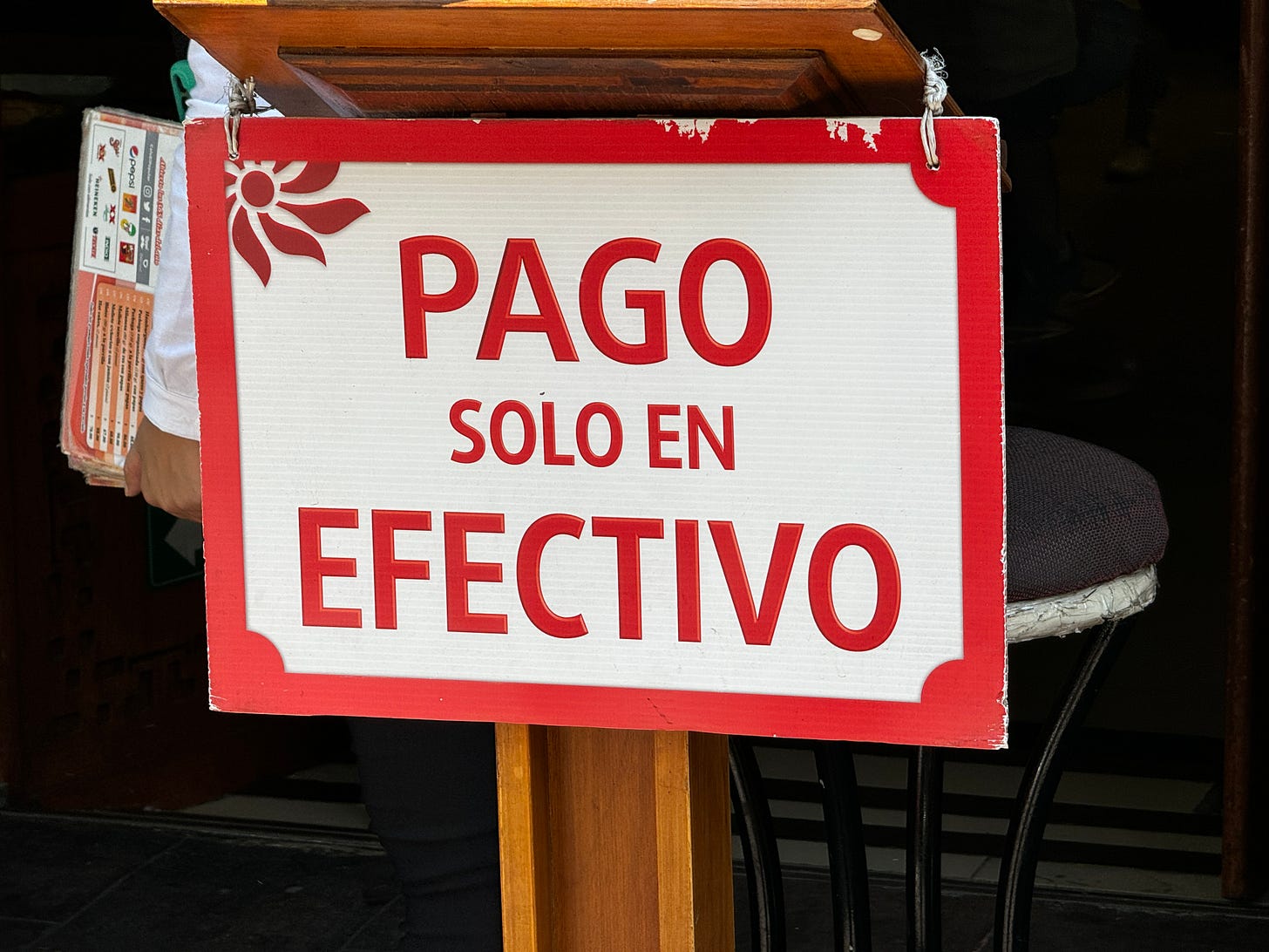 Cash only sign in Spanish