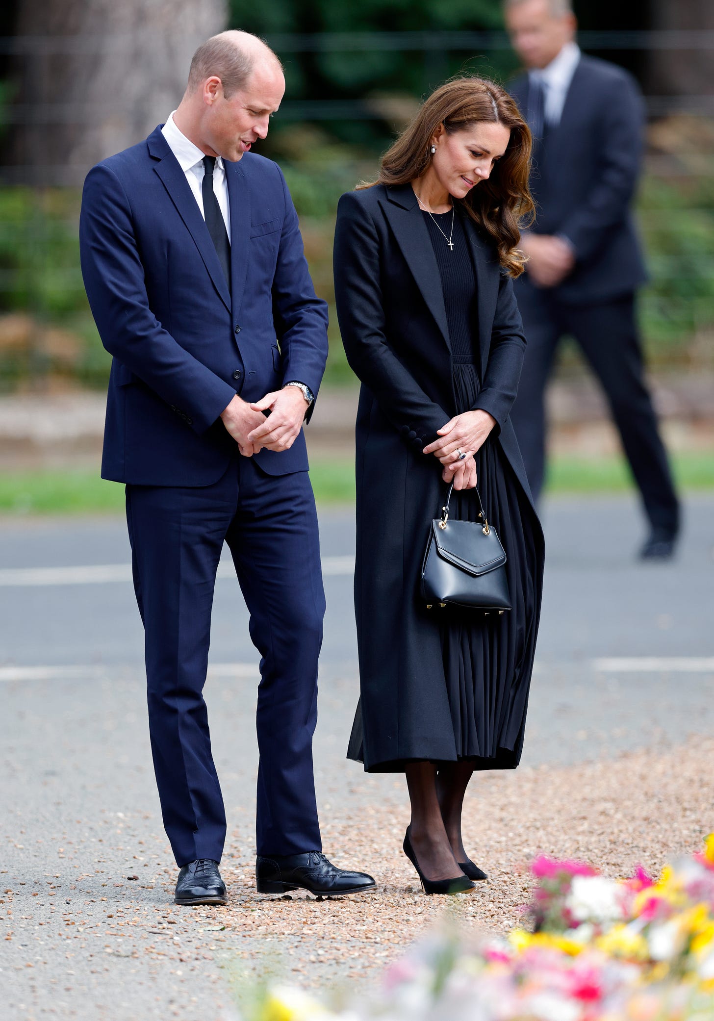 Prince and Princess of Wales looking at floral tributes for the late Queen Prince and Princess of Wales looking at floral tributes for the late Queen