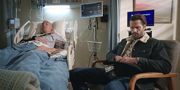 WAlker Cordell asleep in chair next to James hospital bed 2.08. WAlker Cordell asleep in chair next to James hospital bed 2.08.