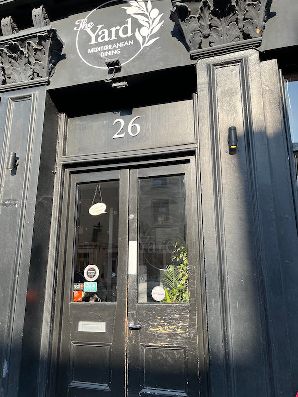 1015-6-19 The Yard, in Chester Dinner restaurant door by Susan Corbin