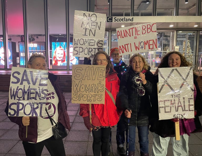 Protesters take to the streets outside BBC offices as broadcaster awards 'Women's Footballer of the Year' to player who failed to meet gender regulations over 'high testosterone'