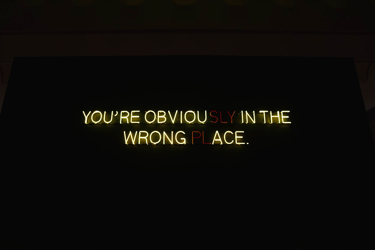 Sign reads: You're obviou... in the wrong ..ace.