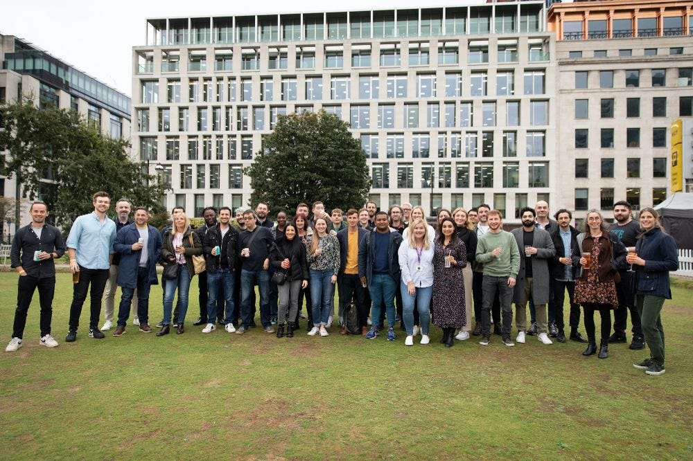 A photo of the Doddle team in a London square lined up celebrating summer in 2023