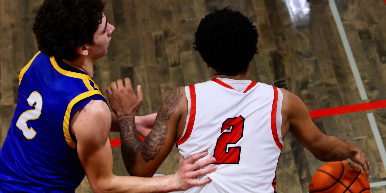 High School Boys Basketball: R.A. Long fends off Kelso, remains undefeated