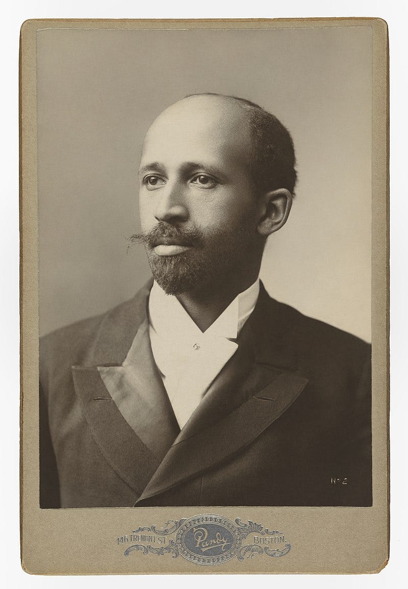 W.E.B. Du Bois as a young man, with elaborate moustache and elegant suit.  W.E.B. Du Bois as a young man, with elaborate moustache and elegant suit.